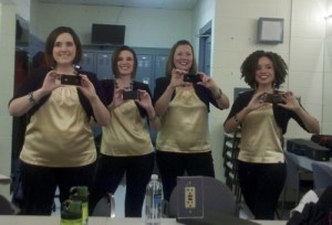 Self portrait in mirror Epic, a female barbershop quartet, poses for a self portrait in the dressing room